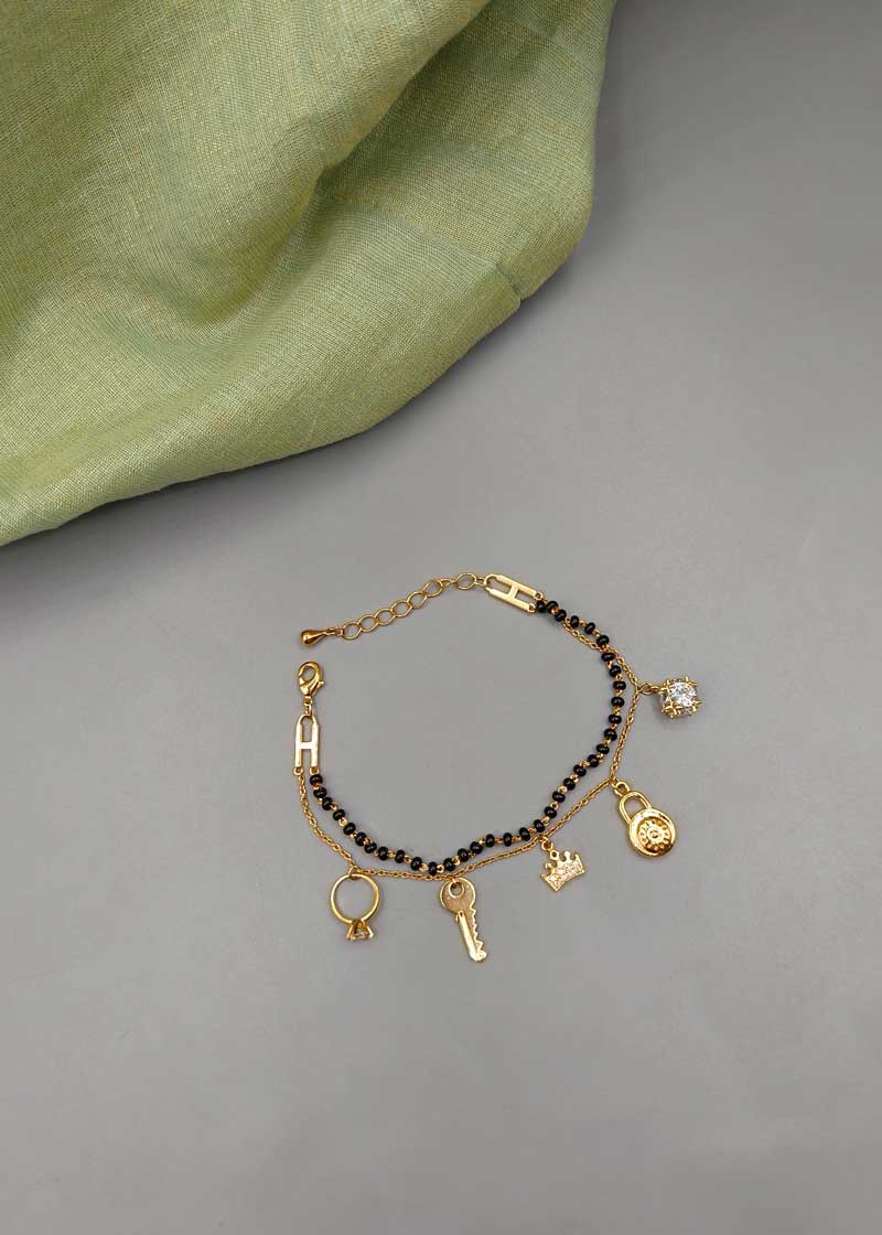 Fancy Charm & Cubic Zircon Gold Plated Mangalsutra Adjustable Bracelet
