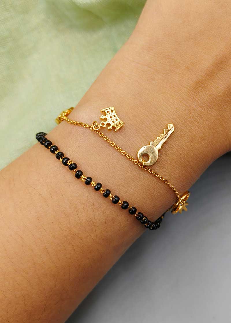 Fancy Charm & Cubic Zircon Gold Plated Mangalsutra Adjustable Bracelet