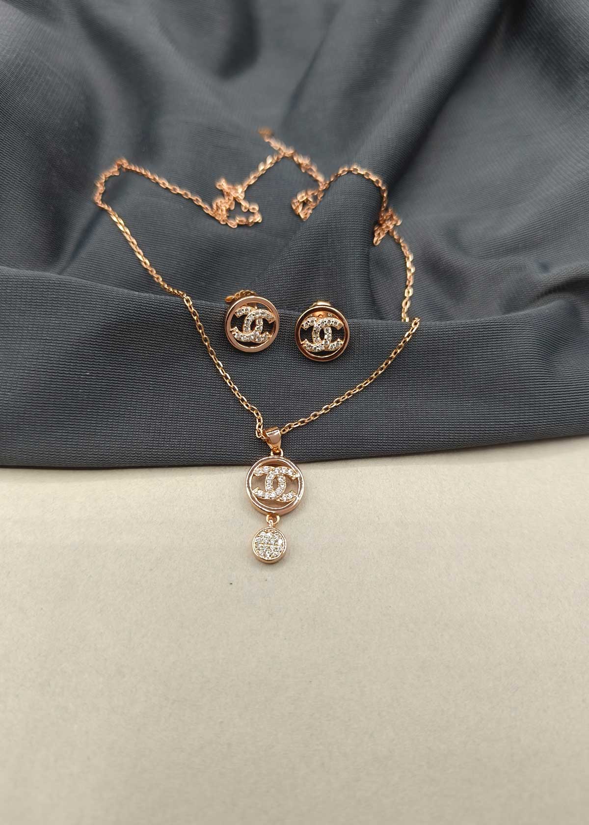 92.5 Sterling Silver Chanel Inspired With Cubic Zircon Stone Round Design Pendant Set With Chain For Women