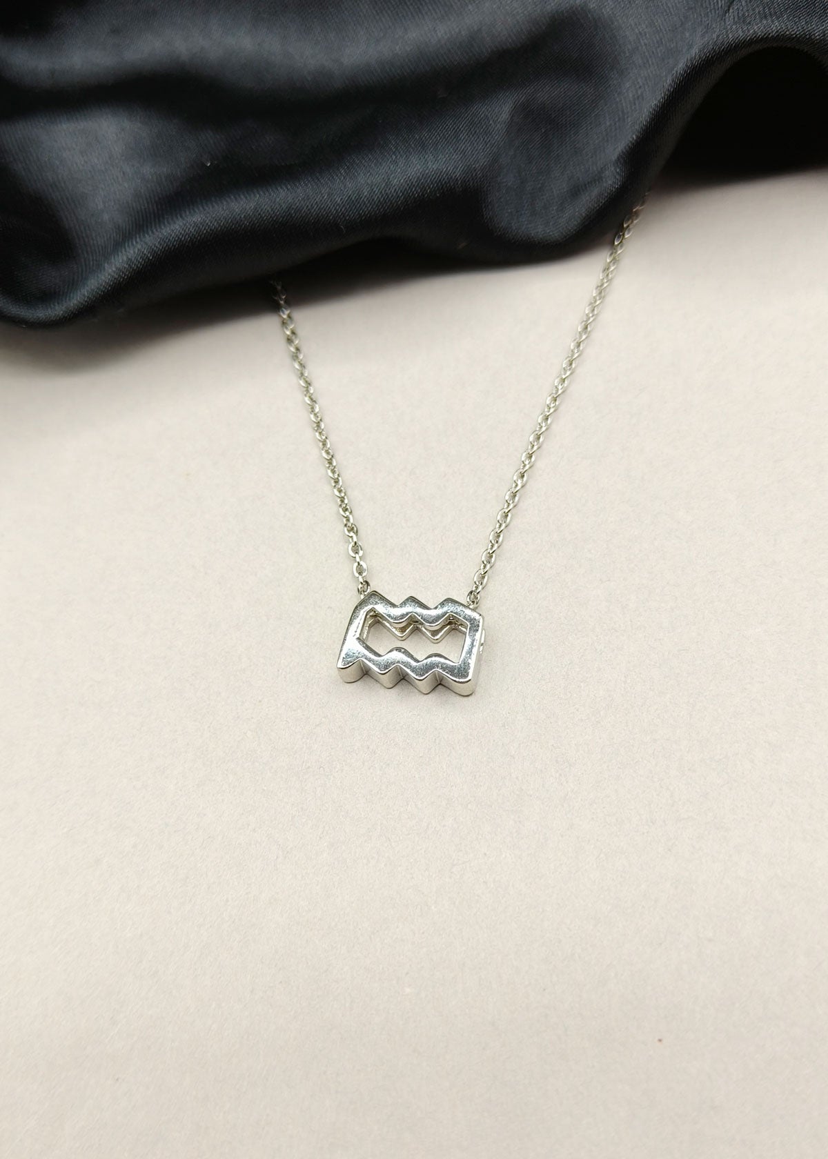 92.5 Sterling Silver Aquarius Zodiac Symbol Pendant + Chain