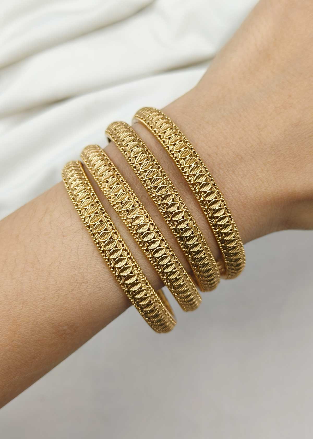 Textured Pattern Antique Gold Bangles (4 Pcs)