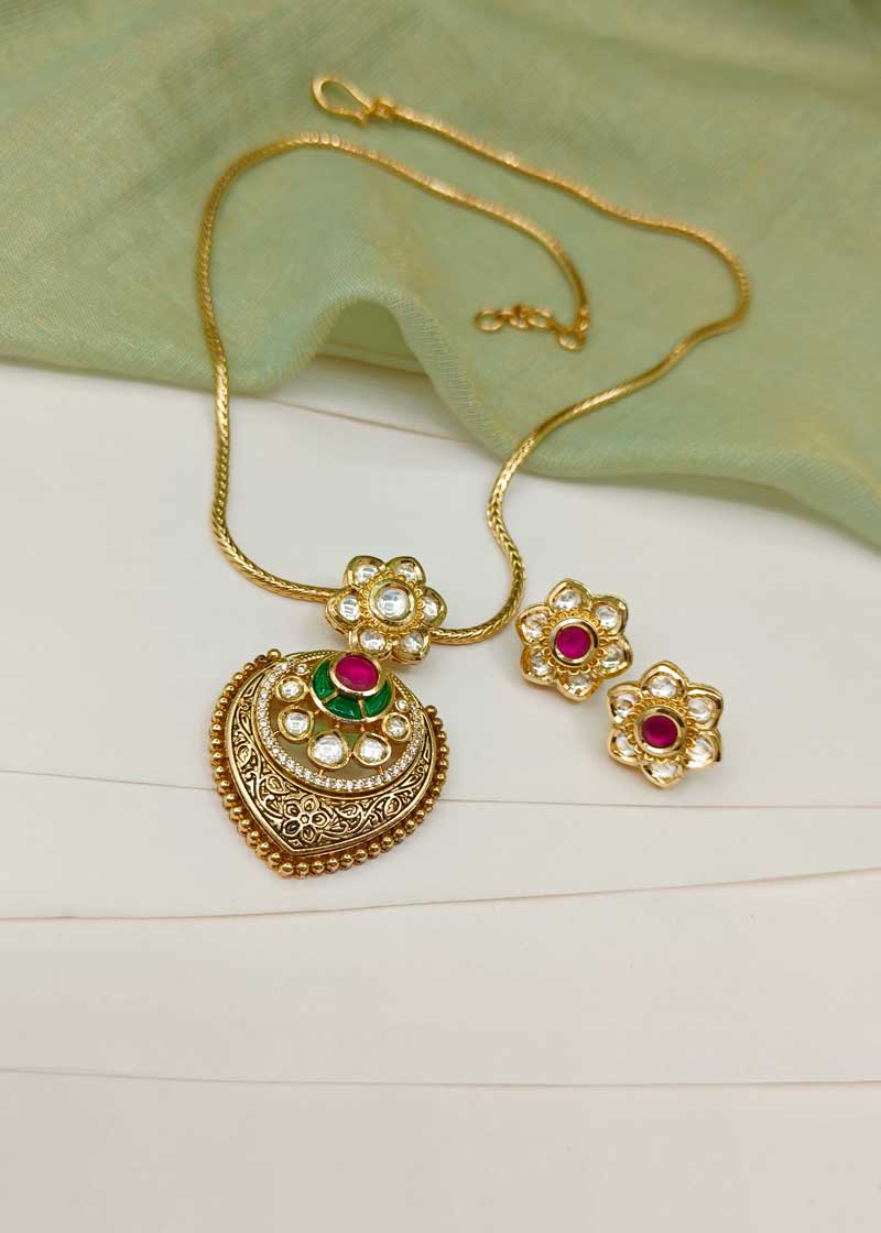 Traditional Floral Drop Shape Engraved Matt Gold Kundan & Cubic Zircon Pendant Set With Chain