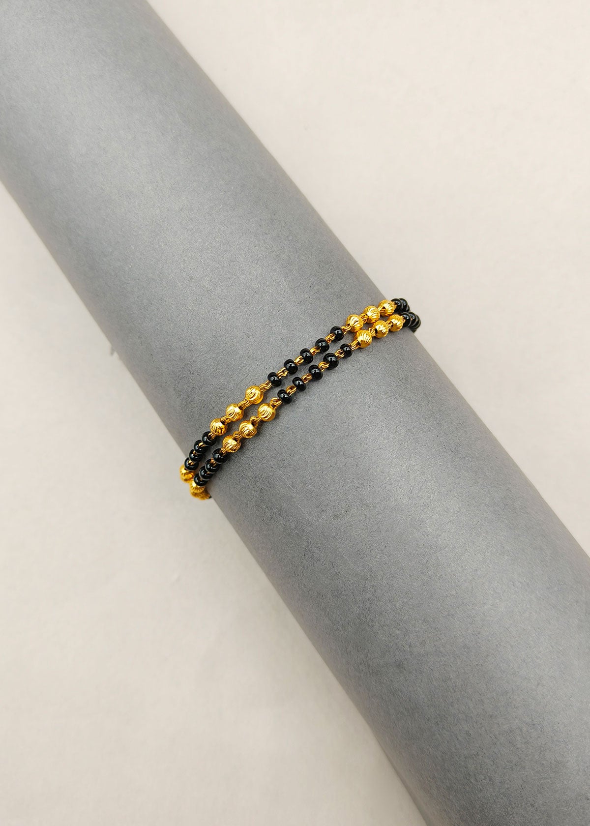 Elegant Double Strand Black Beads Gold Plated Mangalsutra Loose Bracelet