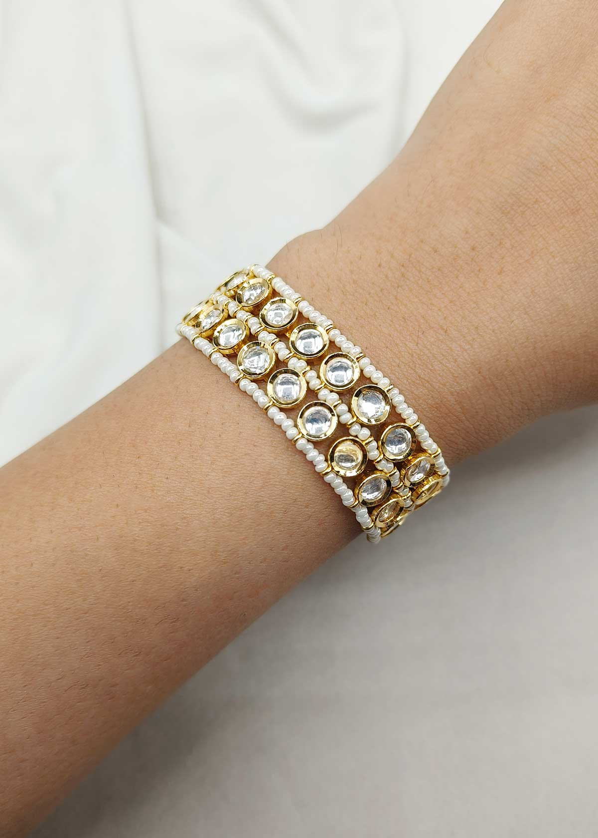 Gold Plated Adjustable Kundan Bracelet With 3 Row Pearl Borders