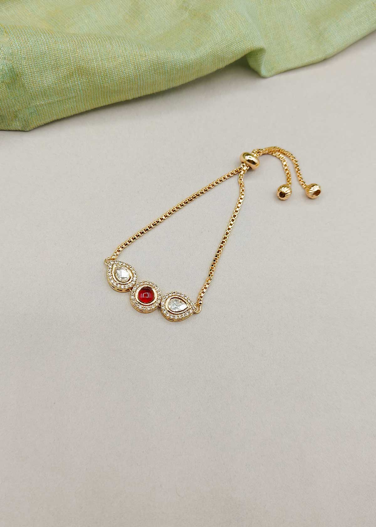 Sleek Trio Colorful Stone Kundan And Cubic Zircon Gold Polished Adjustable Slider Bracelet