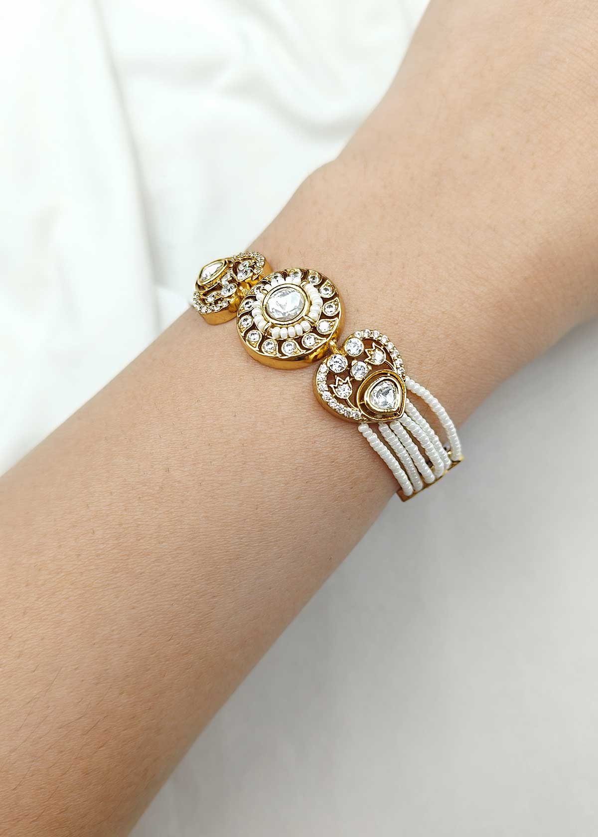Beautiful Circular Style Cubic Zircon And Kundan Antique Gold Multi Strand Pearl Adjustable Slider Bracelet