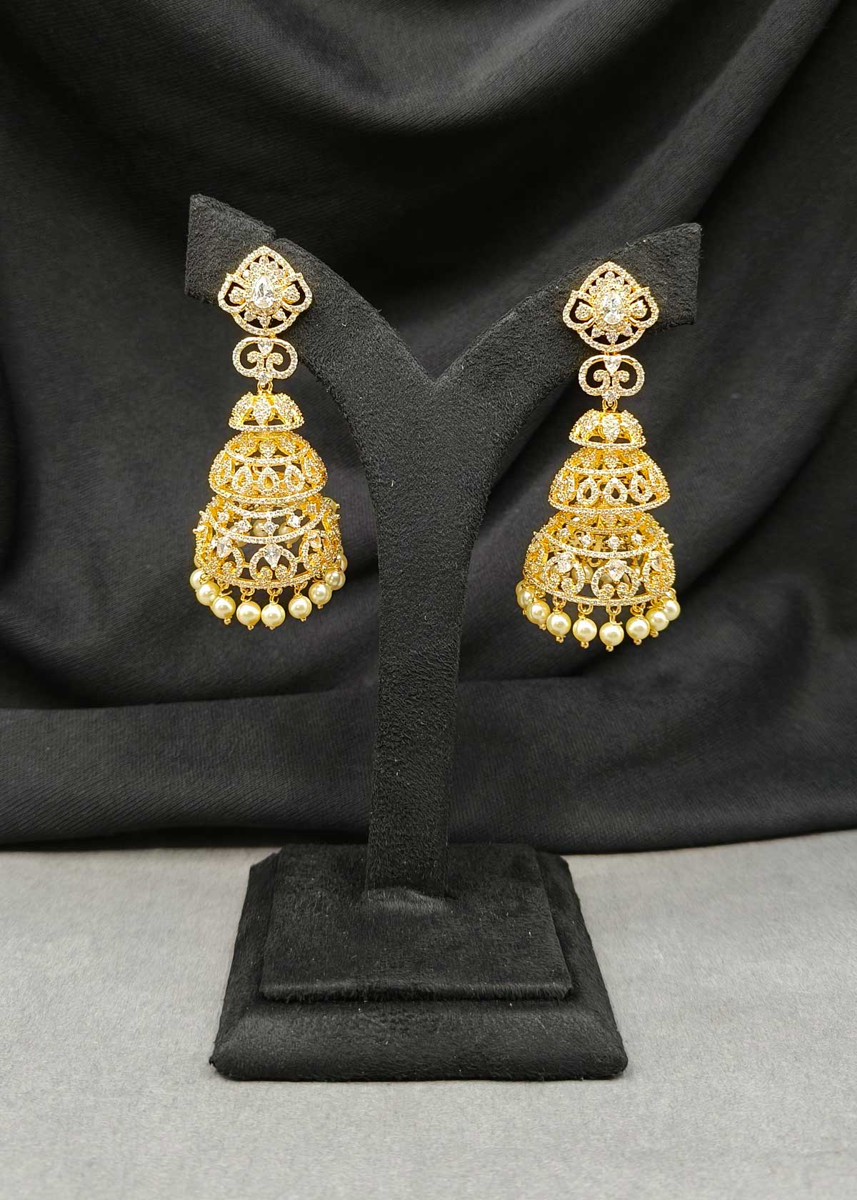 Stunning Triple Layered Cubic Zircon And Pearl Gold Plated Long Jhumka Earrings