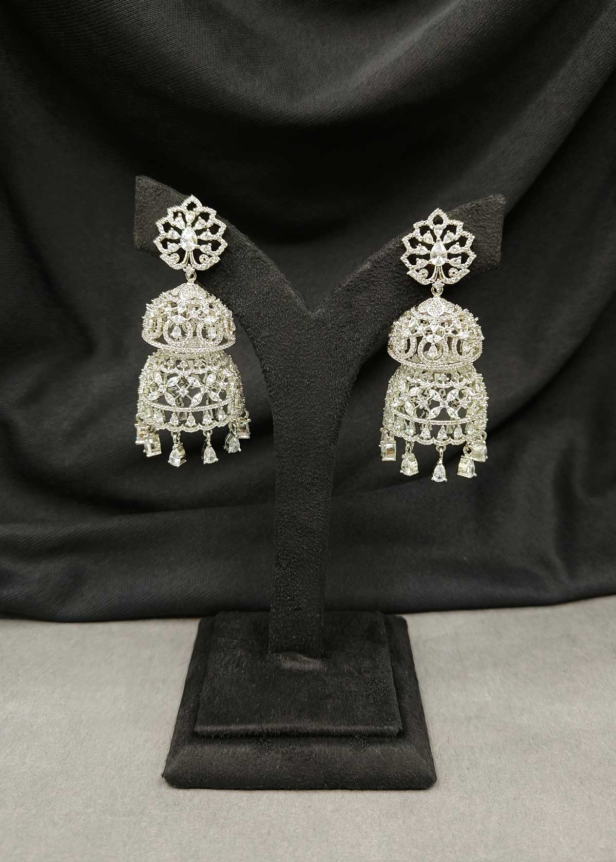 Silver Plated Cubic Zircon Double Dome Jhumkas Earrings With Tear Drop Dangles