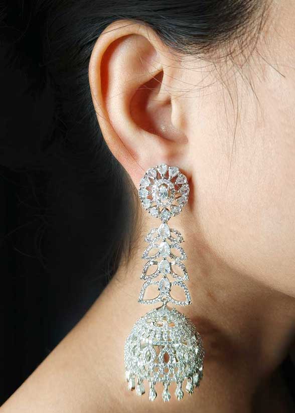 Elegant Silver Plated Cubic Zircon Long Jhumka Earrings With Floral Tear Drops