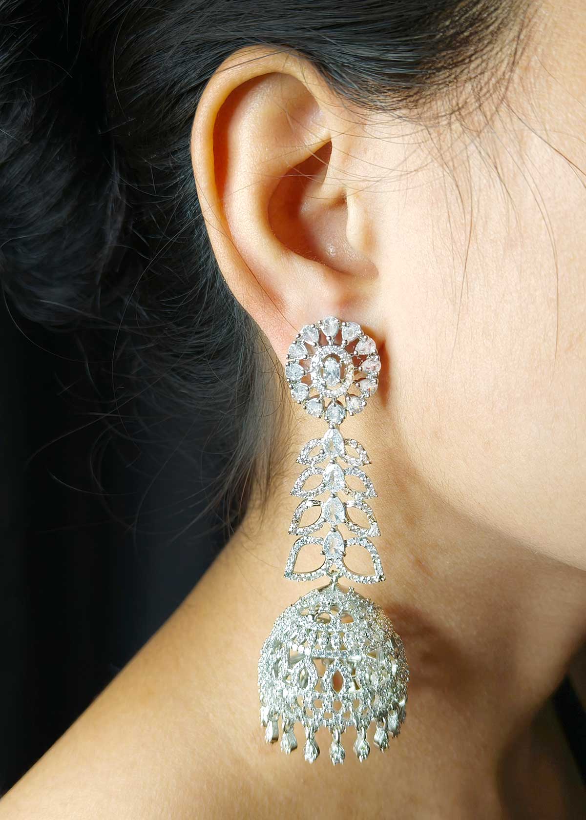 Elegant Silver Plated Cubic Zircon Long Jhumka Earrings With Floral Tear Drops