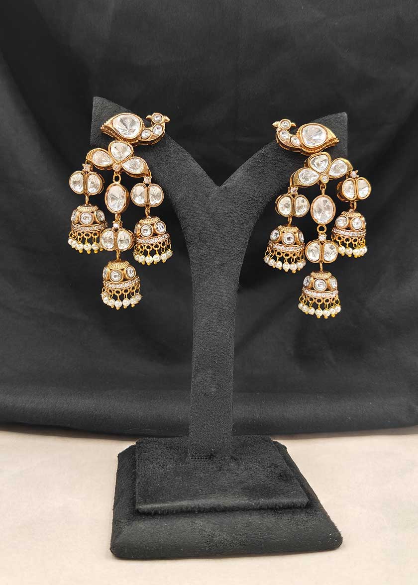 Matt Gold Plated Cubic Zircon Kundan With Pearl Droplets Peacock Motif Jhumka Style Earrings