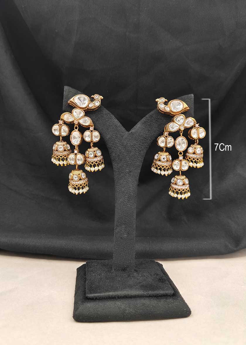 Matt Gold Plated Cubic Zircon Kundan With Pearl Droplets Peacock Motif Jhumka Style Earrings
