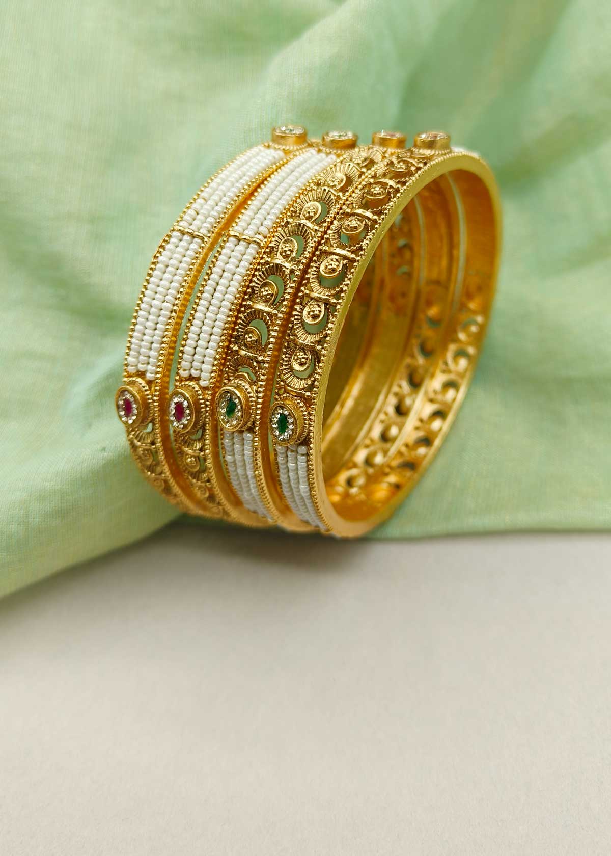 Carat Gold Plated Delicate Row Of Seed Pearl And Cubic Zircon Bangles With Color Stone Accents