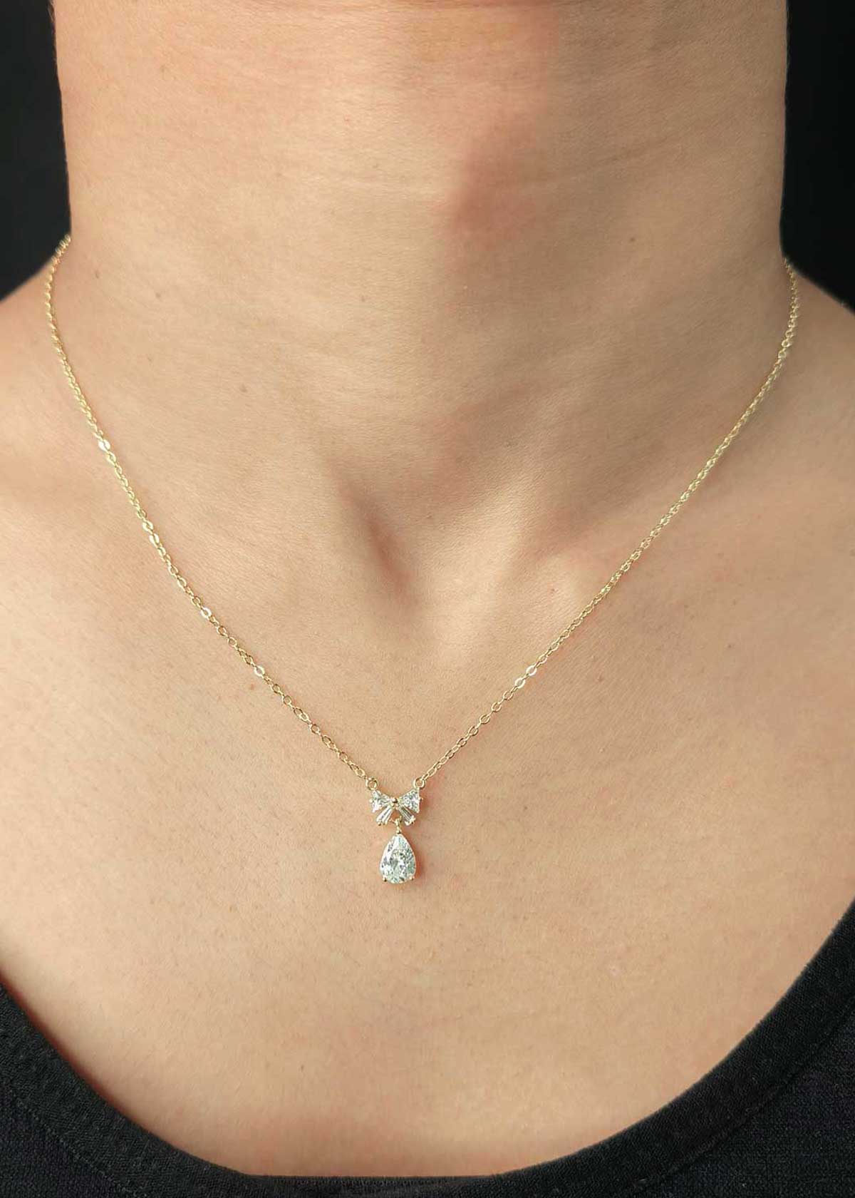 Stunning Bow Style Baguette And Cubic Zircon Gold-Plated Pendant Set With Chain