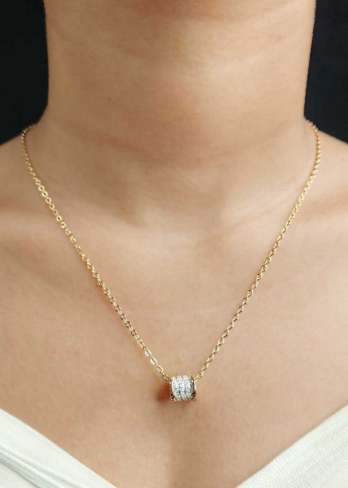 Sophisticated Cylindrical Cubic Zircon Dual Tone Pendant With Chain