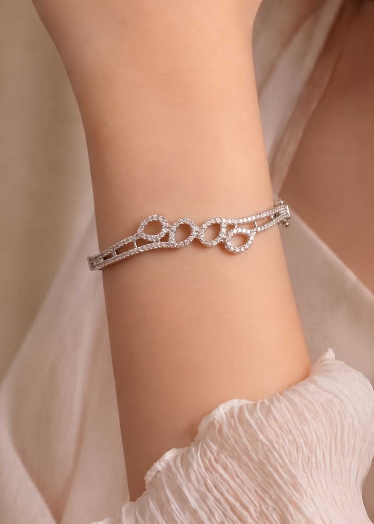 Lustrous Interlocking Links Cubic Zircon Hinged Openable Kada Bracelet For Women