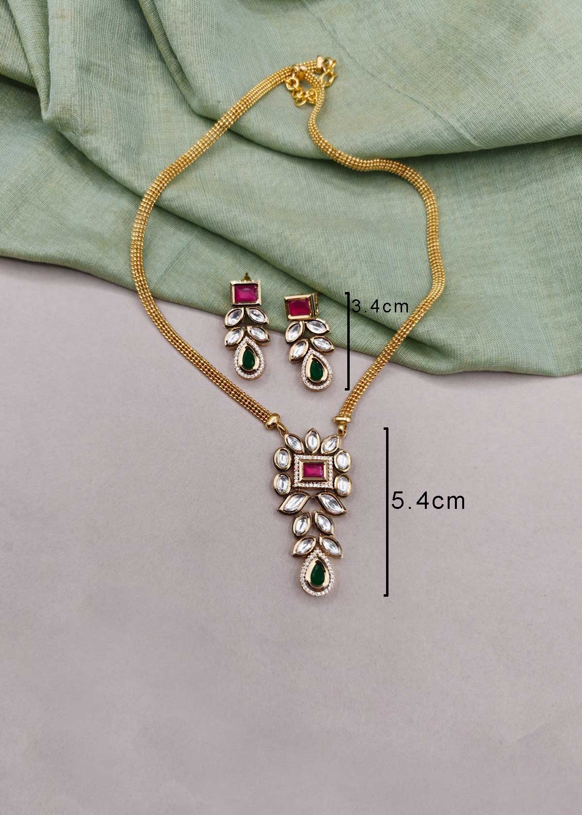 Vintage Style Elongated Kundan Leaf & Cubic Zircon Heavy Pendant Set With Textured Chain For Women