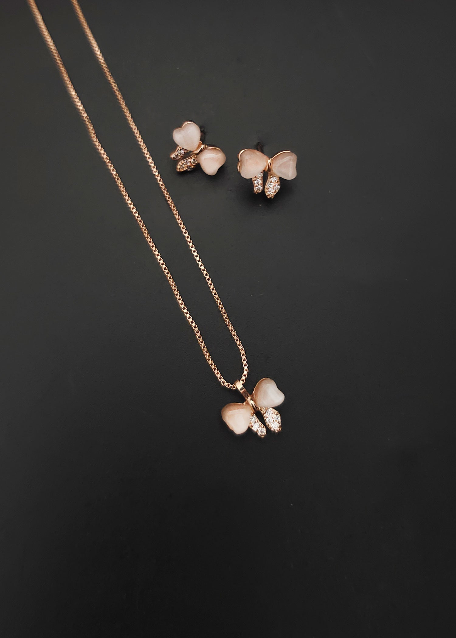 Butterfly design zircon pendant set