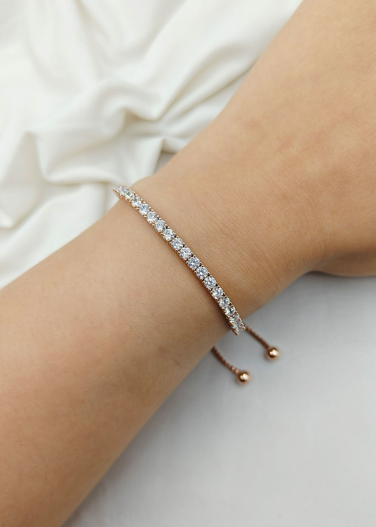 Delicate Gold And Rose Gold Plated Single Line Solitaire Fully Adjustable Loose Bracelet