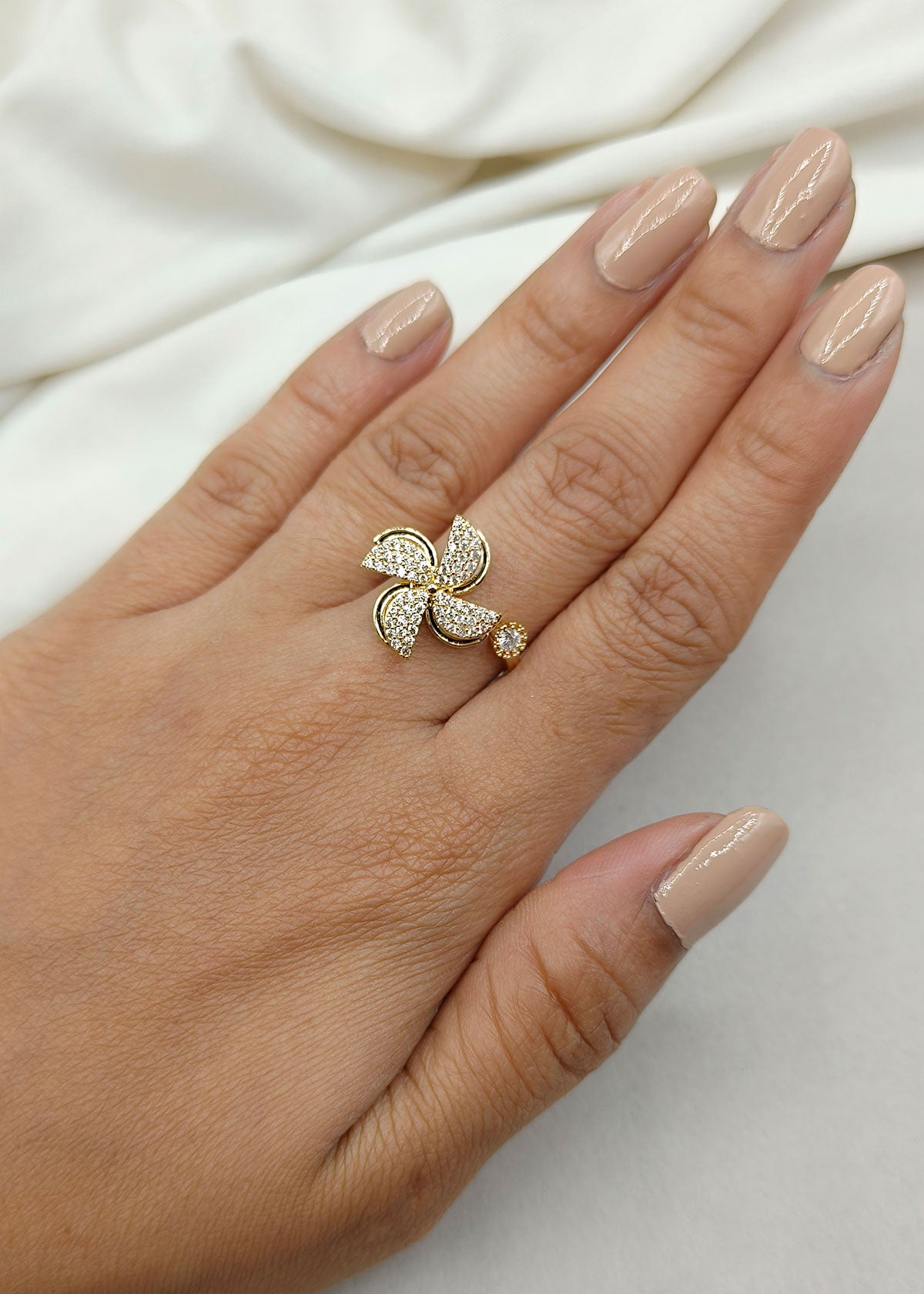 Cubic Zircon Four Petal Design Rotating Gold Plated Adjustable Finger Ring For Women