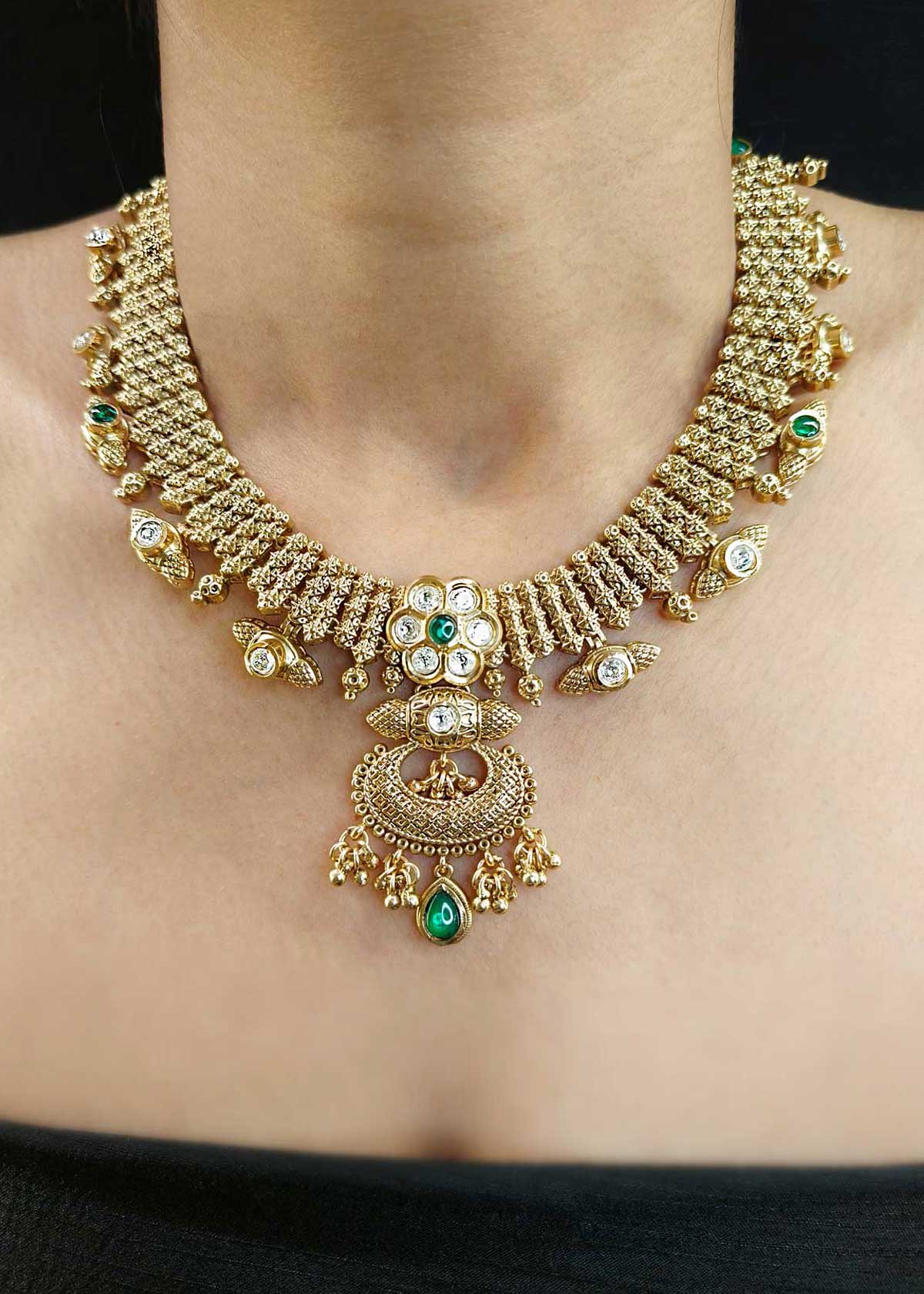 Traditional Kundan Floral Design Antique Gold Plated With Green Stone Temple Necklace Set