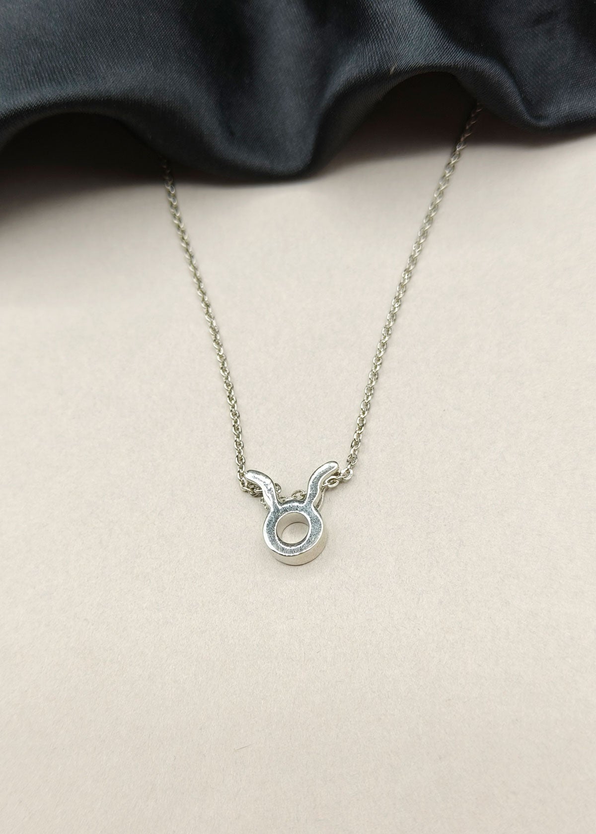 92.5 Sterling Silver Taurus Zodiac Symbol Pendant + Chain