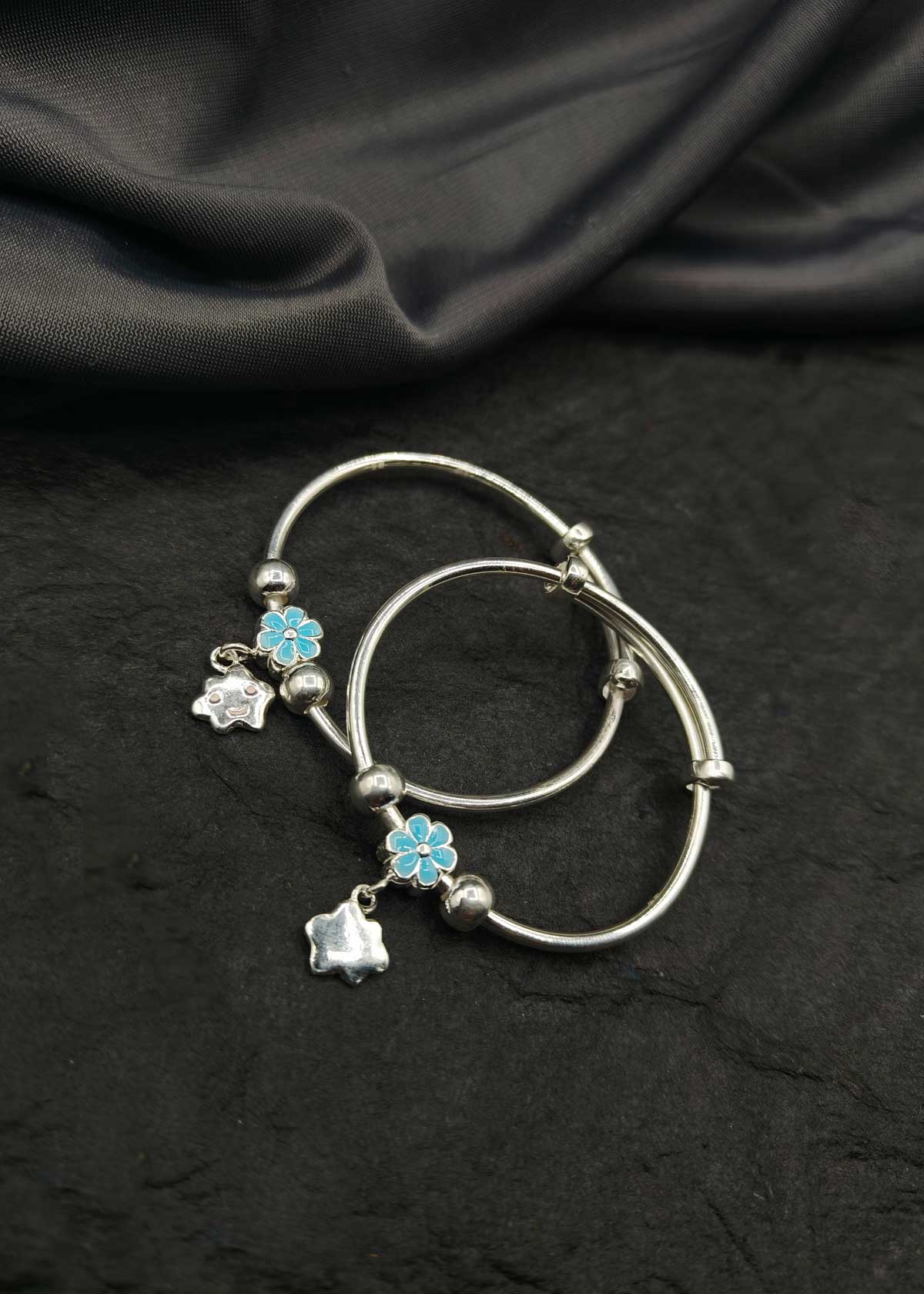 92.5 Sterling Silver Smiley Charm And Blue Meenakari Flower Adjustable Baby Kada