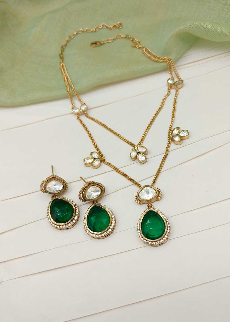 Regal Tear Drop Emerald, Cubic Zircon And Kundan Matte Gold Plated  Layered Pendant Set With Chain