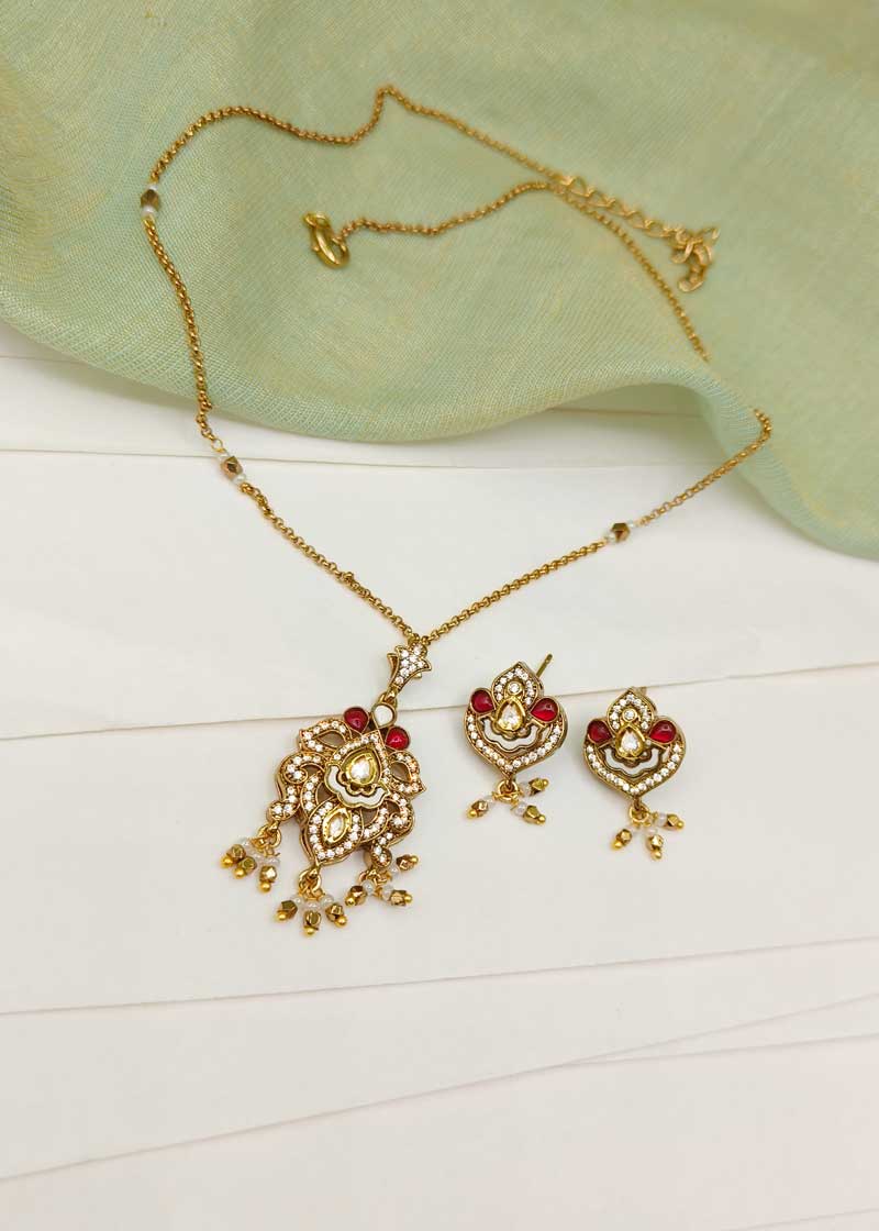 Vintage Inspired Floral Kundan And Cubic Zircon Pendant Set With Chain