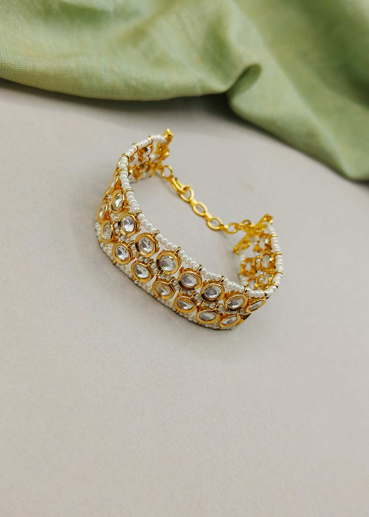 Gold Plated Adjustable Kundan Bracelet With 3 Row Pearl Borders