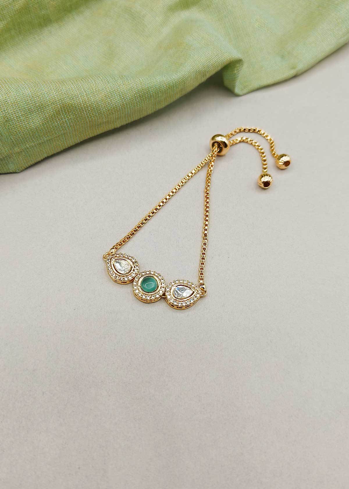 Sleek Trio Colorful Stone Kundan And Cubic Zircon Gold Polished Adjustable Slider Bracelet