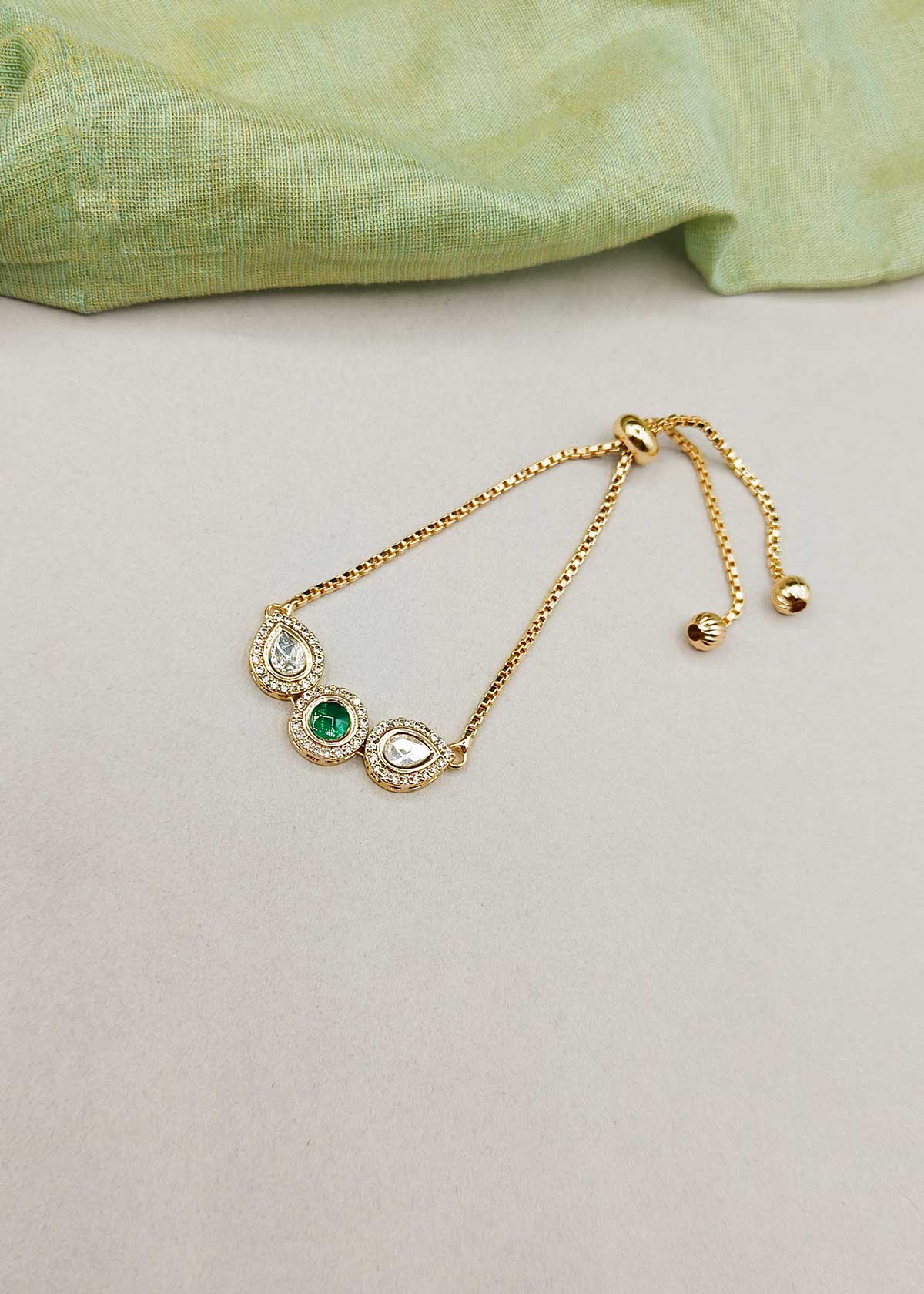 Sleek Trio Colorful Stone Kundan And Cubic Zircon Gold Polished Adjustable Slider Bracelet