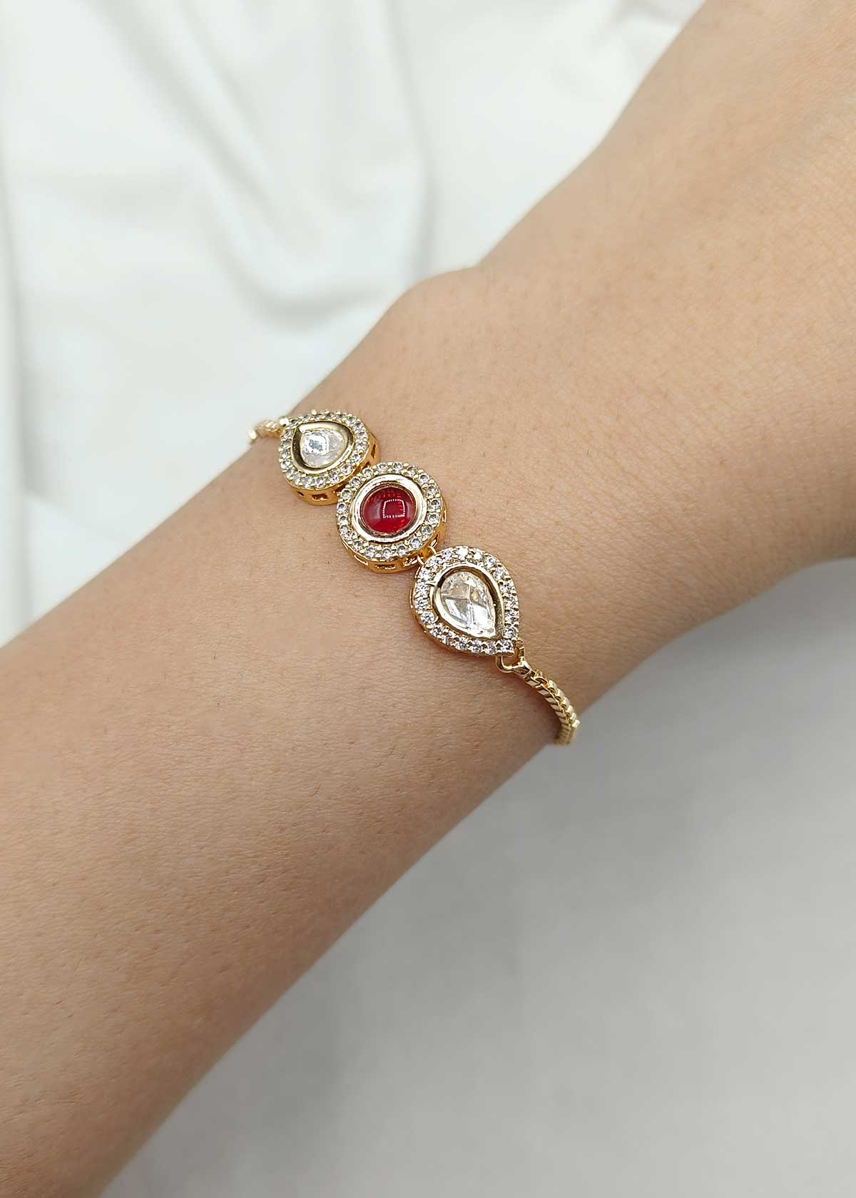 Sleek Trio Colorful Stone Kundan And Cubic Zircon Gold Polished Adjustable Slider Bracelet