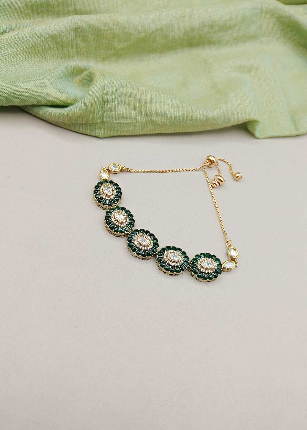 Antique Five Floral Inspired Green Cubic Zircon And Kundan Adjustable Slider Bracelet