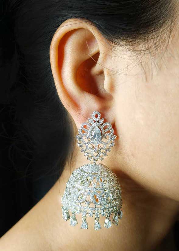 Grand Cubic Zircon Silver Plated Jhumka Earrings With Tear Drop Droplets