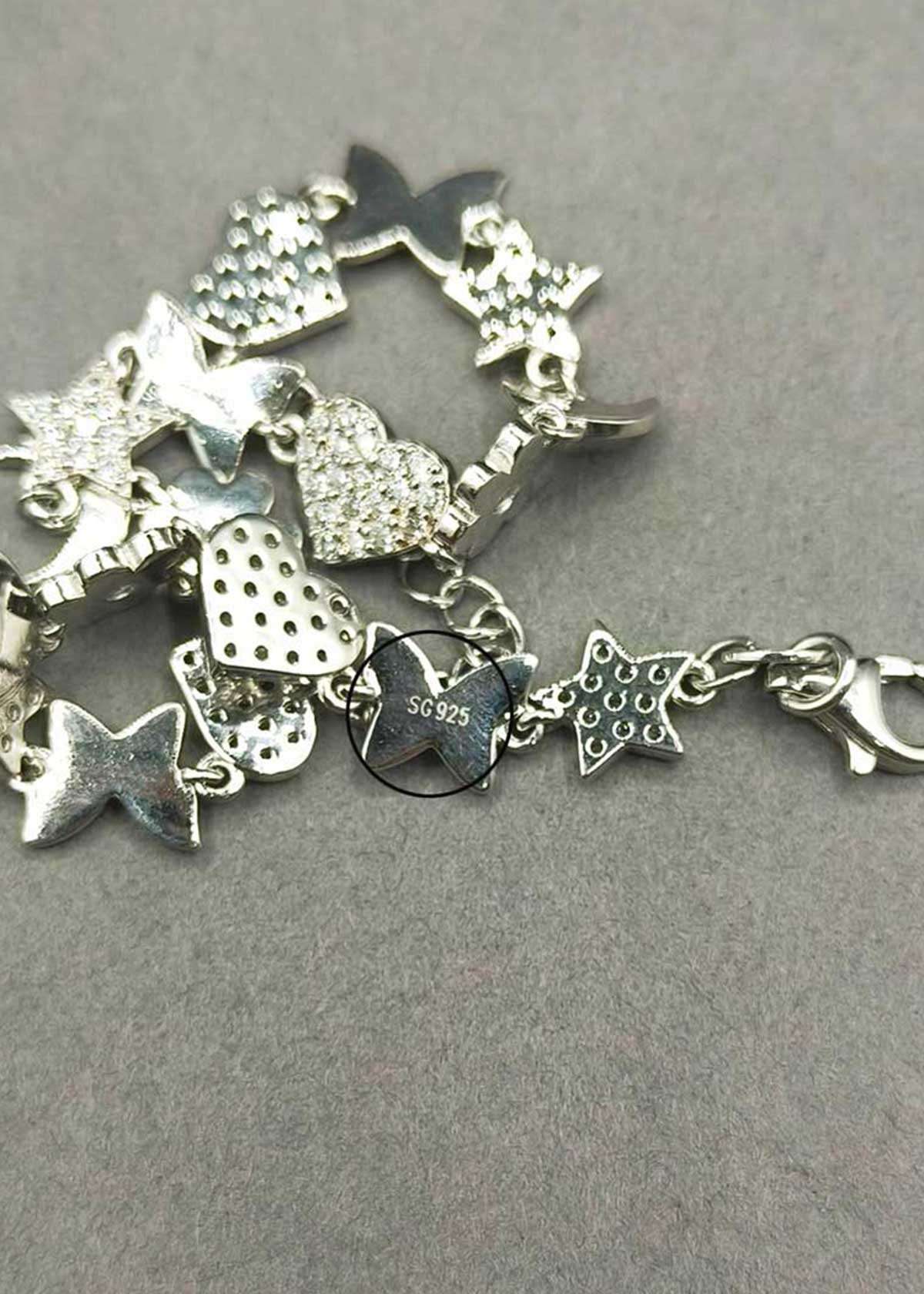 92.5 Sterling Silver Shimmering Cubic Zircon Multi Charm Adjustable Loose Bracelet