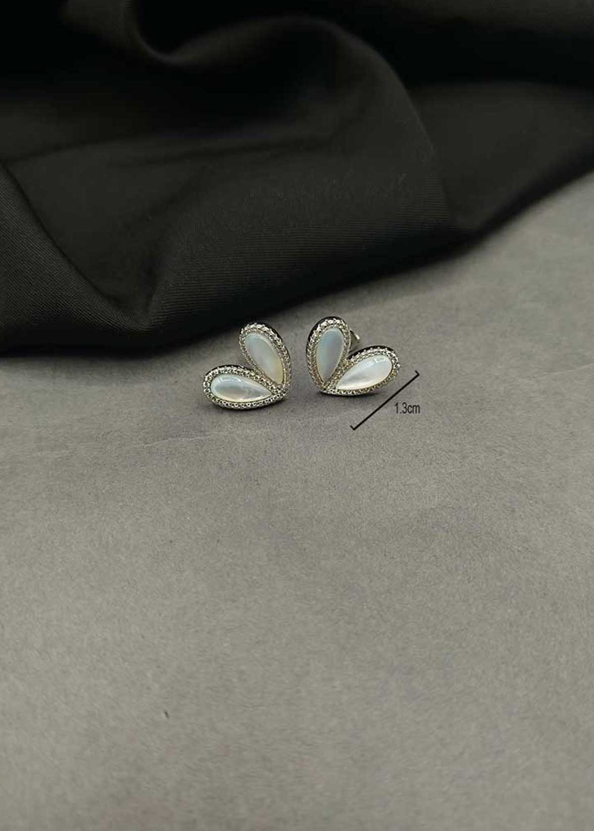 92.5 Sterling Silver Mother Of Pearl And Cubic Zircon Wing Style Stud Earrings