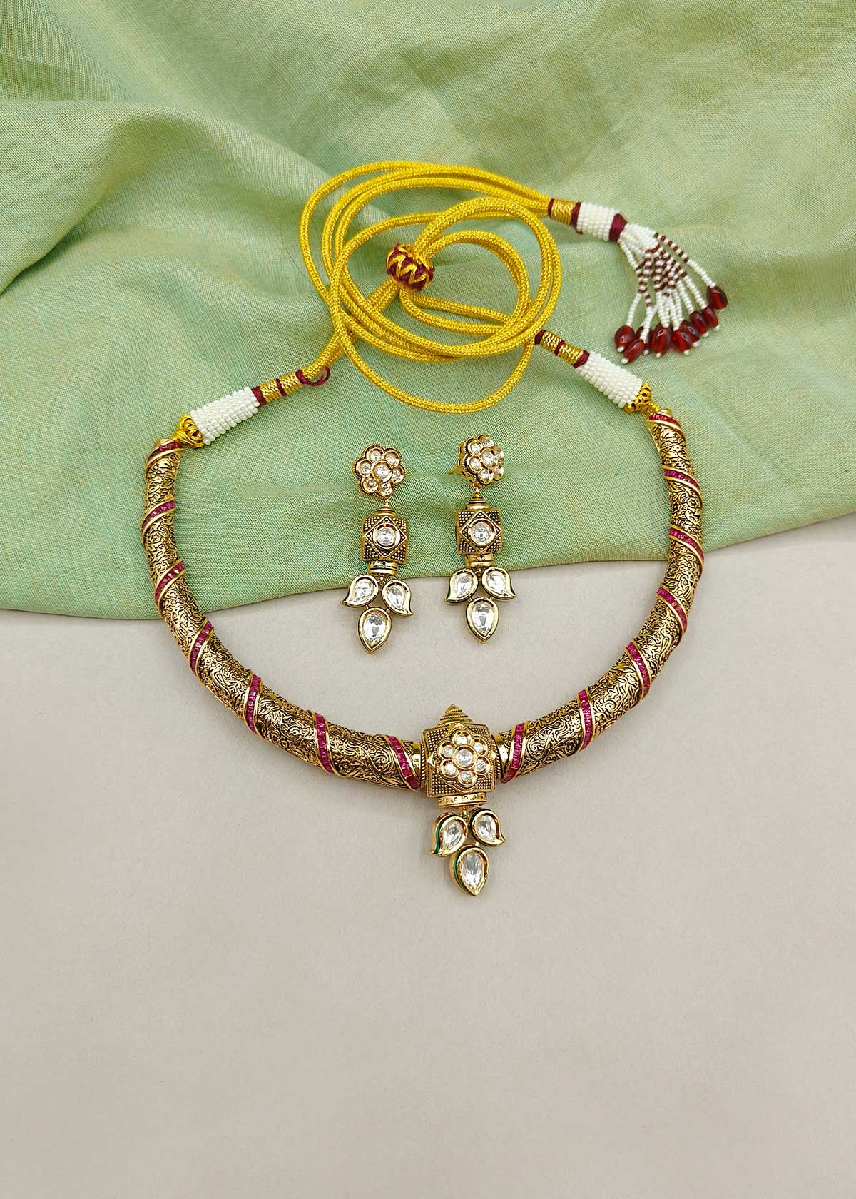 Handcrafted Matt Gold Plated Kundan And Cubic Zircon Engraved Choker Style Short Necklace Set