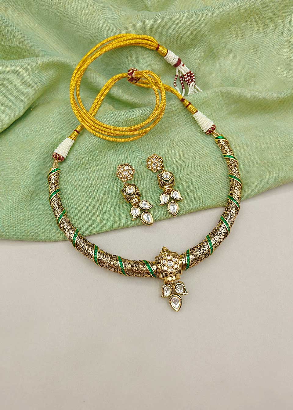 Handcrafted Matt Gold Plated Kundan And Cubic Zircon Engraved Choker Style Short Necklace Set