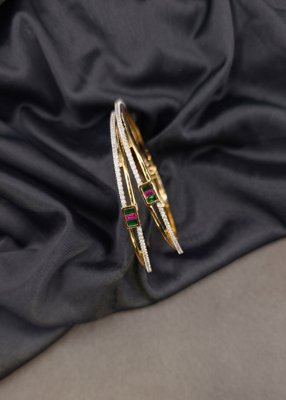 Sleek Cubic Zircon Stone Fixed Bangles With Green & Pink Detailing For Women (Pair)